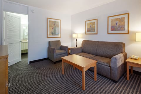 Suite, 1 King Bed, Non Smoking | In-room safe, desk, laptop workspace, blackout drapes