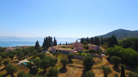 Set in 10 acres of olive groves 150 metres from the beach. 