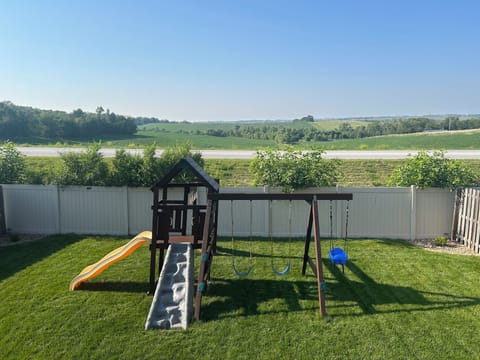 Kid’s play set in fully fenced backyard