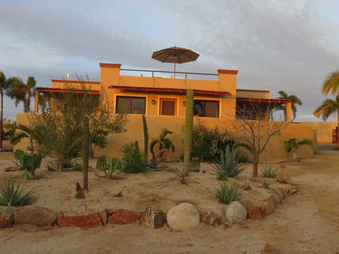 Full wrap around patio with peaceful gardens.