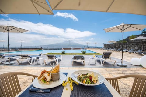 Indoor pool, outdoor pool, pool umbrellas, sun loungers