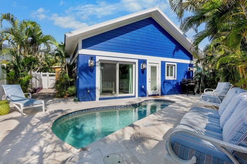 House featuring a pool oasis