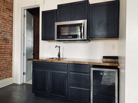 Luxury Studio, 2 Double Beds (206) | Private kitchenette | Mini-fridge, coffee/tea maker, highchair