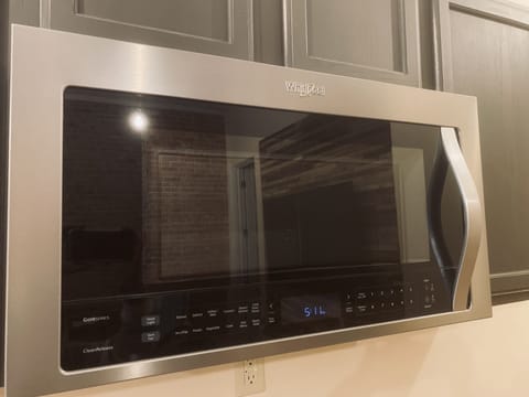 Luxury Studio, 1 Queen Bed (204) | Private kitchenette | Mini-fridge, coffee/tea maker, highchair