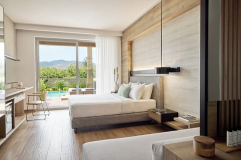 Classic Room, Pool Access | Minibar, in-room safe, desk, laptop workspace