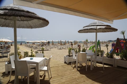 Private beach, sun loungers, beach umbrellas, beach bar