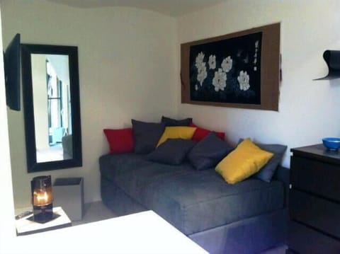 Studio, Balcony | Living area | Flat-screen TV