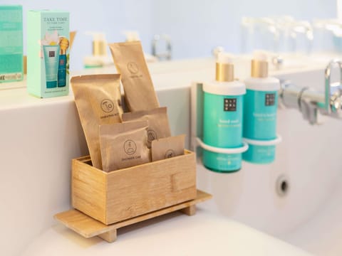 Eco-friendly toiletries, hair dryer, towels, soap