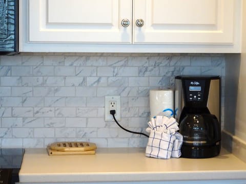 Make your coffee in the morning then sit on the balcony to enjoy it!