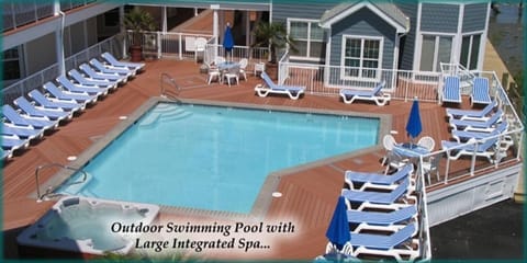 Sunset Bay Villas Pool and outside shower overlooking the bridge