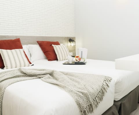 Twin Room (Interior) | Individually decorated, blackout drapes, free WiFi, bed sheets