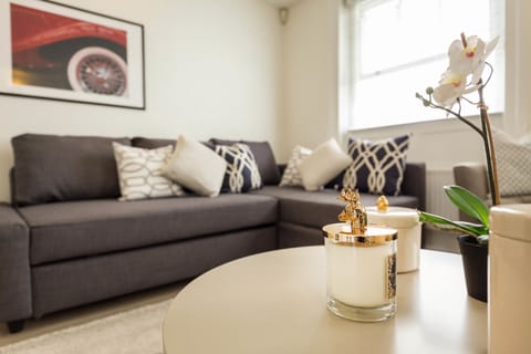 Apartment - Split Level | Living area | Flat-screen TV