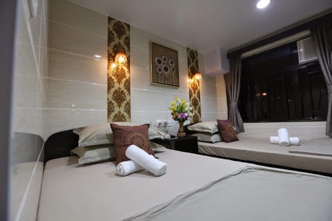 Family Room, Private Bathroom | Iron/ironing board, free WiFi, bed sheets
