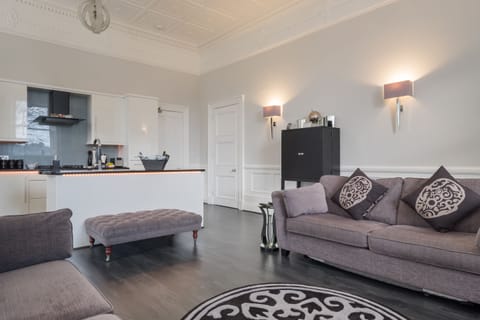 "Platinum" Luxury Apartment Double Bed with Double Walk-in Shower | Living area | 55-inch flat-screen TV with satellite channels, Smart TV, Netflix