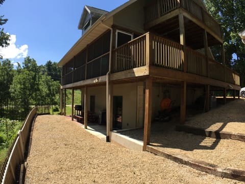 Back of the house with barbecue and sitting area