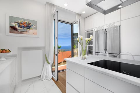 Apartment, 3 Bedrooms | Private kitchen | Full-size fridge, microwave, oven, stovetop