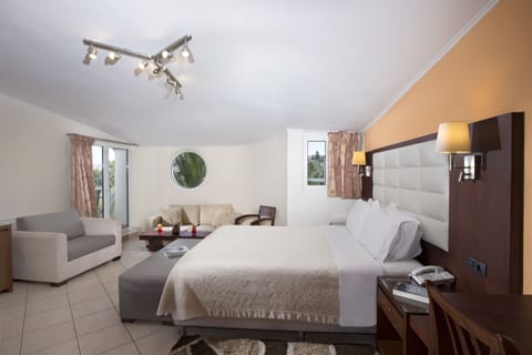 Junior Suite | Minibar, in-room safe, iron/ironing board, free WiFi