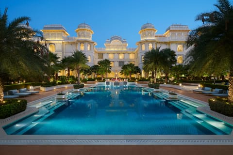 Outdoor pool, open 7 AM to 8 PM, pool umbrellas, sun loungers