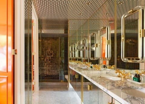 Combined shower/tub, designer toiletries, hair dryer, bathrobes