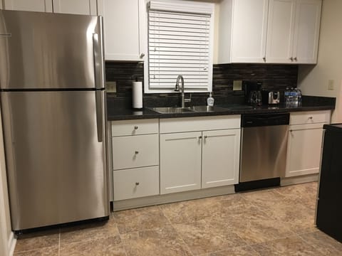 All new Kitchen!  Completely Stocked!  Coffee maker, dishes, pots and pans, etc.
