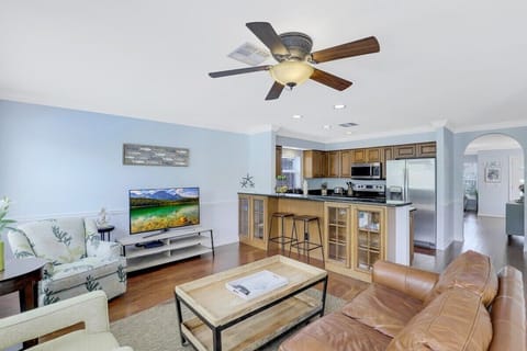 Family room has plenty of seating for watching your favorite movie or just relaxing