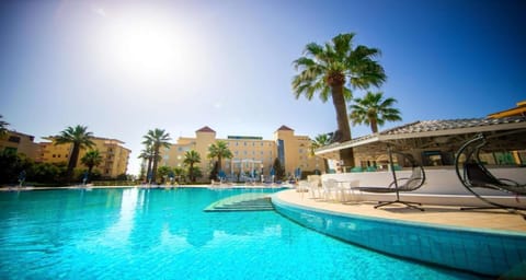 Indoor pool, seasonal outdoor pool, cabanas (surcharge), pool umbrellas