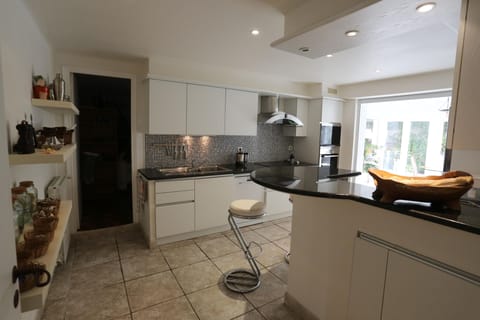 Th kitchen as seen when coming from the living room