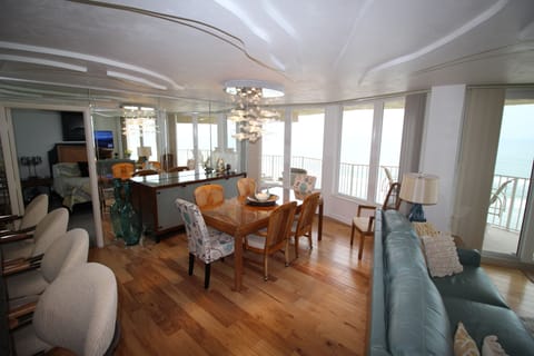 Your dining table seats eight, kitchen bar counter seats four.