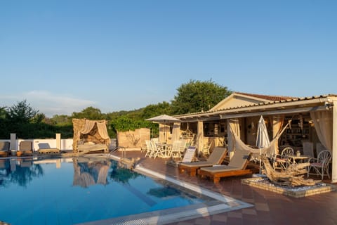 Seasonal outdoor pool, open 9:00 AM to 7:00 PM, free cabanas