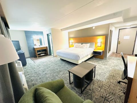 Suite, 1 King Bed with Sofa bed, Non Smoking | Premium bedding, in-room safe, desk, iron/ironing board