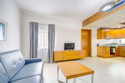 Desk, laptop workspace, blackout drapes, iron/ironing board