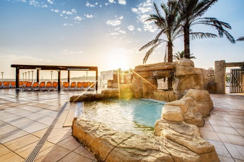 Indoor pool, seasonal outdoor pool, pool umbrellas, sun loungers