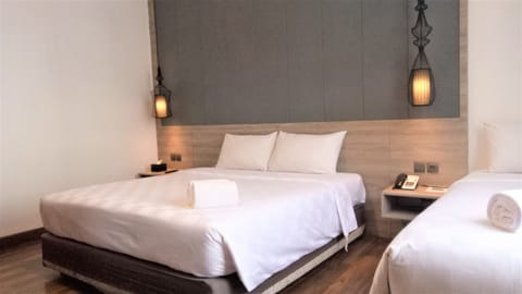 Family Triple Room | Egyptian cotton sheets, premium bedding, pillowtop beds, in-room safe