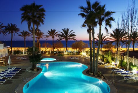 Indoor pool, outdoor pool, pool umbrellas, sun loungers