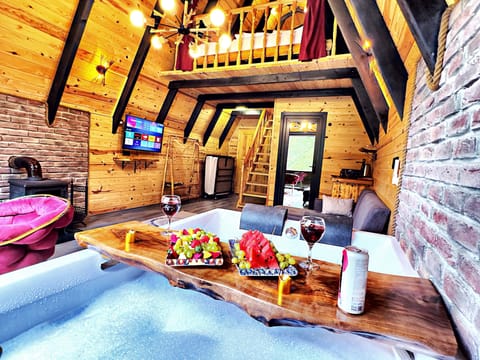 Luxury Suite, Jetted Tub, River View | Television