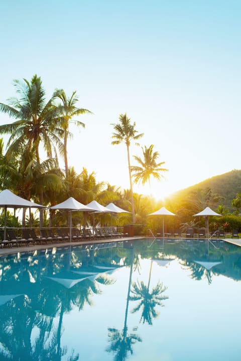 Outdoor pool, pool umbrellas, sun loungers
