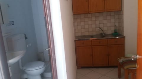 Standard Triple Room, Partial Sea View | Iron/ironing board, bed sheets