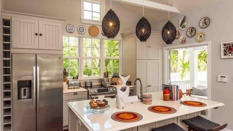 The eat-in kitchen is completely up-to-date and has all of the tools and equipment needed to create a gourmet meal...