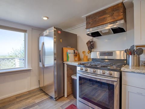 The kitchen comes fully equipped to meet all your culinary needs and two full-sized fridges,