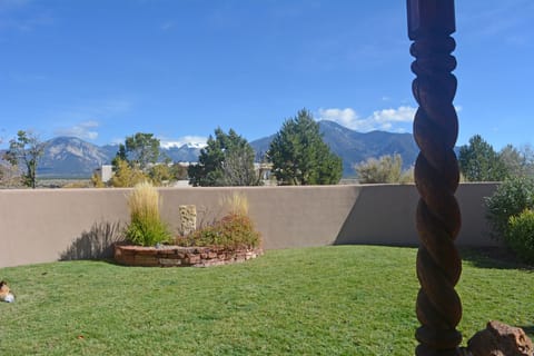 Adobe wall enclosed yard for seclusion and privacy all with mountain views