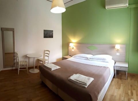 Double or Twin Room, Shared Bathroom | Minibar, in-room safe, desk, cribs/infant beds