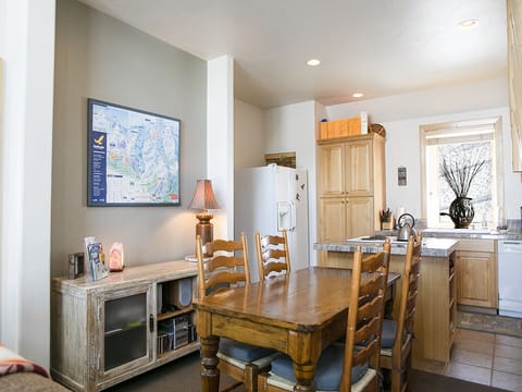 Interior Dining Area - Interior Dining Area with kitchen in background.