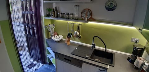 Exit to Dining Terrace, barbeque and pool.