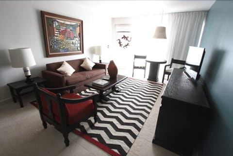 Luxury Suite, Hot Tub, Garden View | Living area | 32-inch LCD TV with cable channels, TV