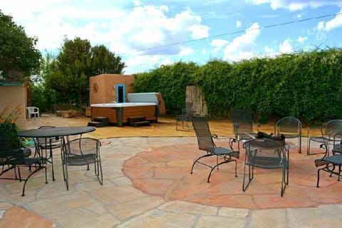 Giant upscale luxury hot tub and sauna, abundant patio dining plus fire pit for evening gathering