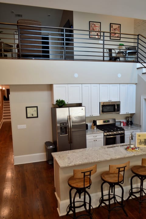 Kitchen and dining on main level, living room up