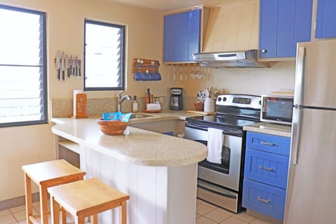 Kitchen is fully equipped with pots, pans and appliances