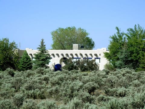 Main house surrounded by native southwest sage