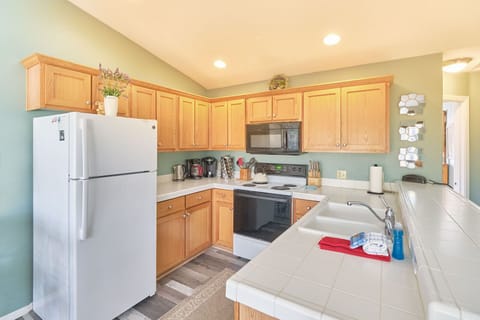 Kitchen - Fully stocked for your cooking needs.