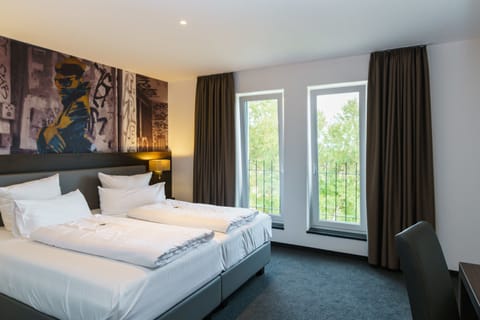 Comfort Twin Room | Premium bedding, desk, soundproofing, free WiFi